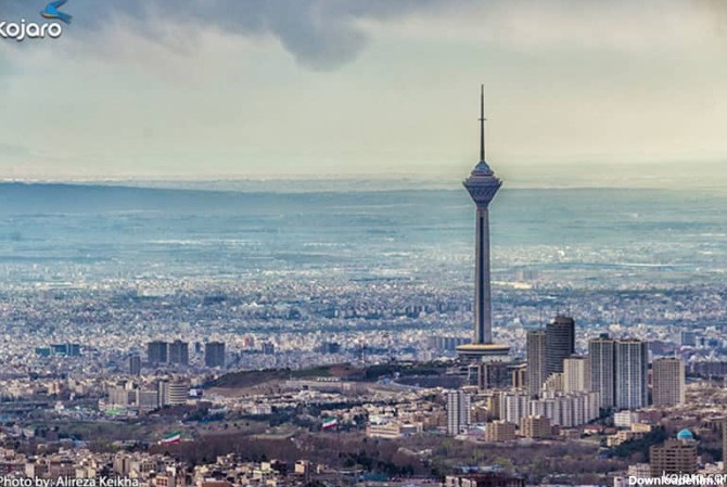 نمای برج میلاد و شهر تهران از بام لند