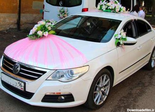 تزیین ماشین عروس با گل و تور
