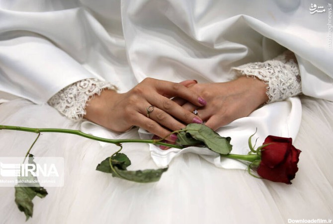 مشرق نیوز - عکس/ جشن ازدواج ۳۱۳ عروس و داماد در مشهد