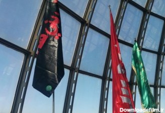 پرچم متبرک آستان حسینی بر فراز بلندترین نقطه تهران برافراشته شد/ عکس