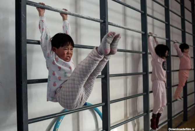 تصاویر | مدرسه ژیمناستیک در چین | تمرین‌های طاقت فرسا برای المپیک ...