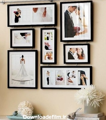 عکس عروس و داماد روی دیوار اتاق خواب