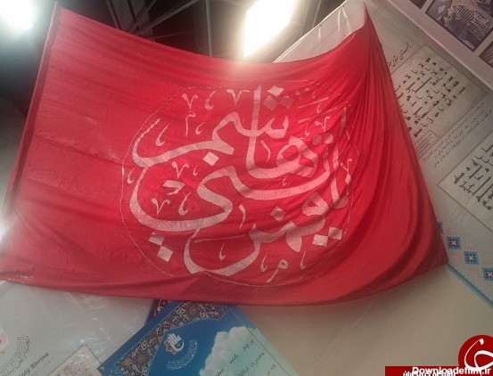 پرچم حرم حضرت عباس درنمایشگاه قرآن/عکس
