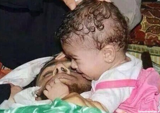 گریه کودک خردسال فلسطینی بر پیکر پدر شهیدش+تصویر - تسنیم