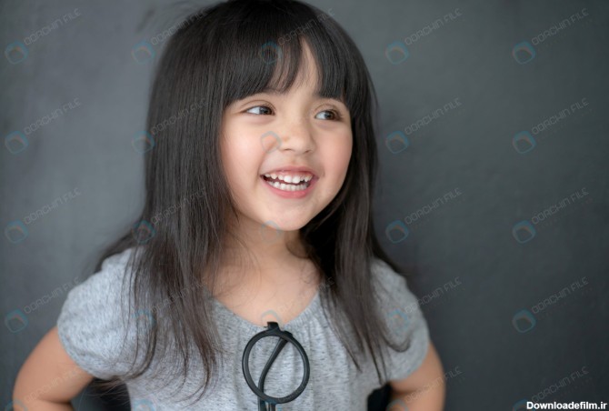 عکس دختر بچه آسیایی شاد از نمای نزدیک - مرجع دانلود فایلهای دیجیتالی