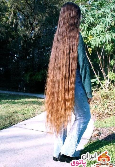 عکس دختر با موهای بلند در طبیعت