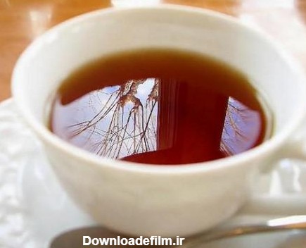 لیوان چای روی میز در انتظار یک جرعه است - عکس ویسگون