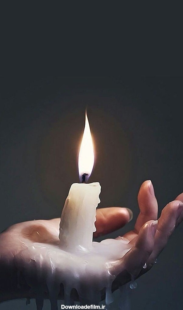 دانلود عکس شمع ساده ذوب شده در دست