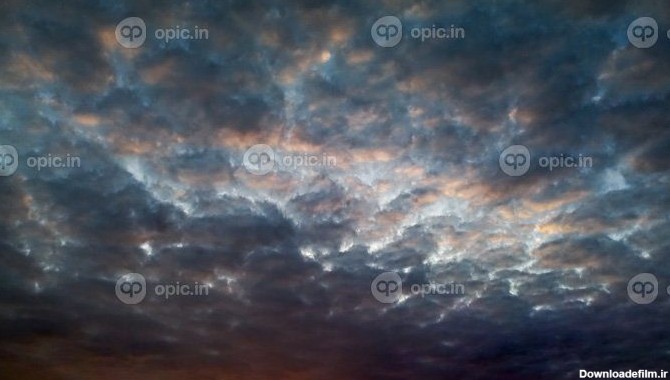 دانلود عکس ابرهای ابری در غروب آفتاب هوای طبیعت و | اوپیک