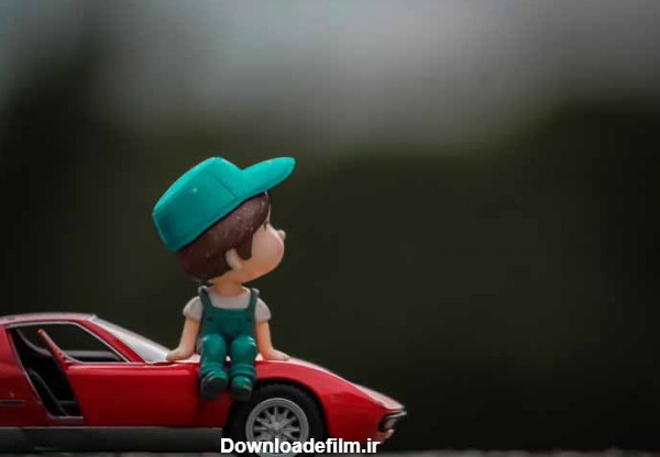 دانلود تصویر باکیفیت عروسک پسر و ماشین