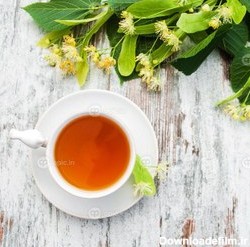 خرید و قیمت دانلود عکس فنجان چای گیاهی با گل نمدار | ترب