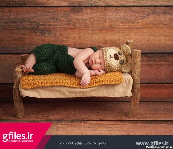 دانلود تصویر با کیفیت از نوزاد خوابیده رو تخت فانتزی