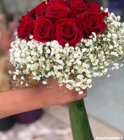 عکس کیک عروسی با گل رز قرمز