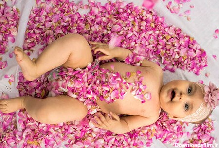 تصاویر غلتاندن نوزادان در گل | گل غلتان ؛ لطیف‌ترین رسم سنتی ایرانی را  ببینید