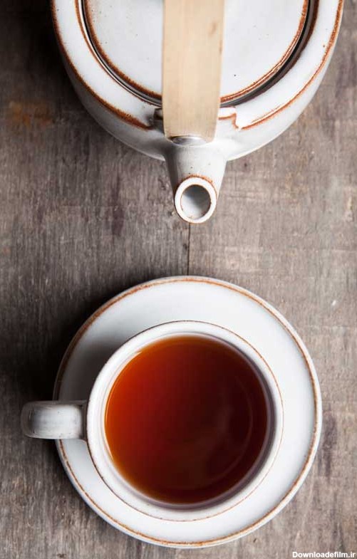عکس فنجان و قوری چای از نمای بالا