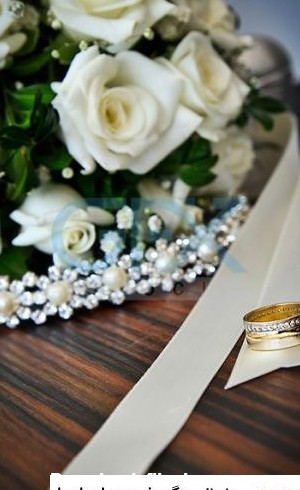 عکس حلقه ازدواج و گل
