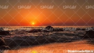 تصویر با کیفیت منظره غروب آفتاب همراه با غروب دریا و ساحل دریا