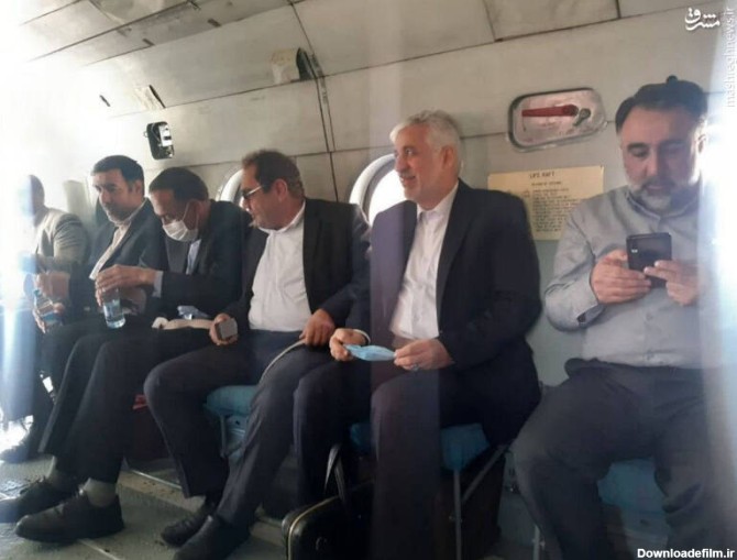 مشرق نیوز - تصویری از مرحوم احمدی در کنار وزیر ورزش در بالگرد