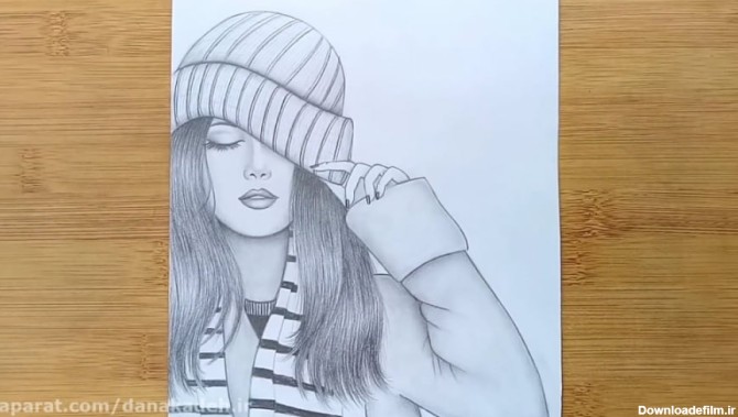 نقاشی یک دختر با کلاه زمستانه