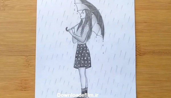 چگونه یک دختر با چتر در روز بارانی بکشیم؟