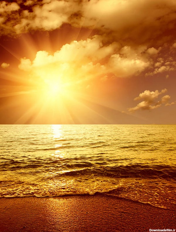 عکس غروب خورشید در ساحل دریا - مسترگراف
