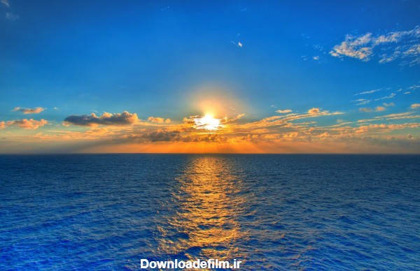 عکس طلوع و غروب خورشید در کنار دریا