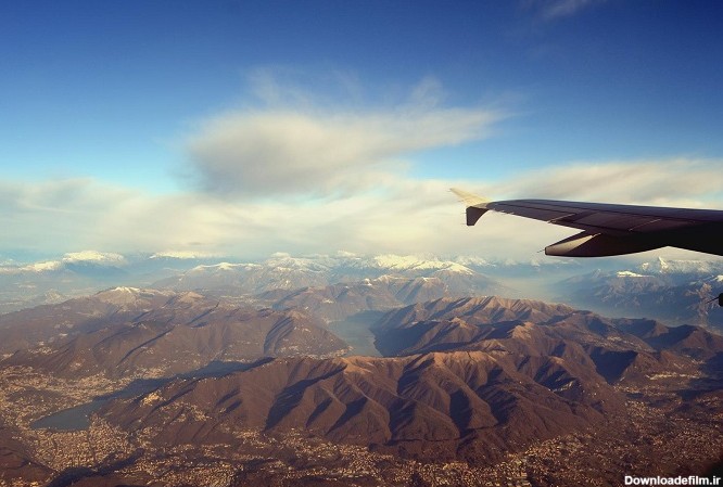 عکاسی حرفه‌ای از پشت پنجره هواپیما - مجله گردشگری