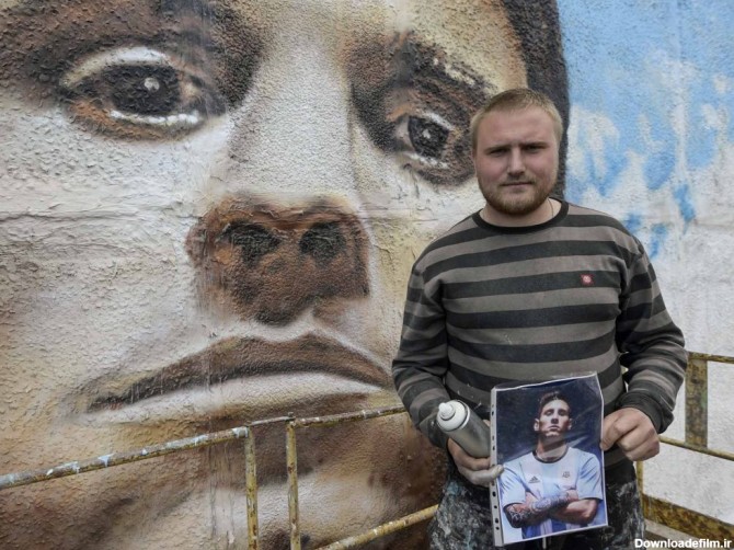 هنرمند روسی و نقاشی مسی روی دیوار شهر مسکو | مجله اینترنتی آل اسپرت