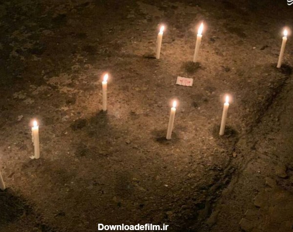 مشرق نیوز - عکس/ روشن کردن شمع در محل شهادت شهید سلیمانی