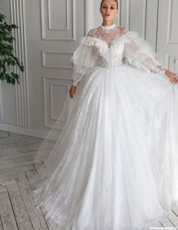 مدل لباس عروس ۲۰۲۳ آستین دار و دامن پرنسسی بسیار زیبا - مگسن