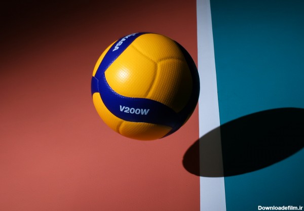 بک گراند توپ والیبال بر روی زمین سالن برای دسکتاپ