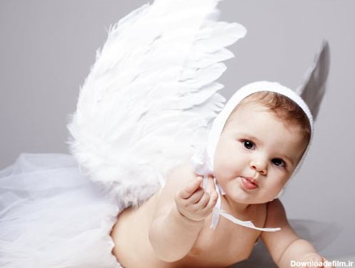 عکس با کیفیت از دختر بچه با بال فرشته