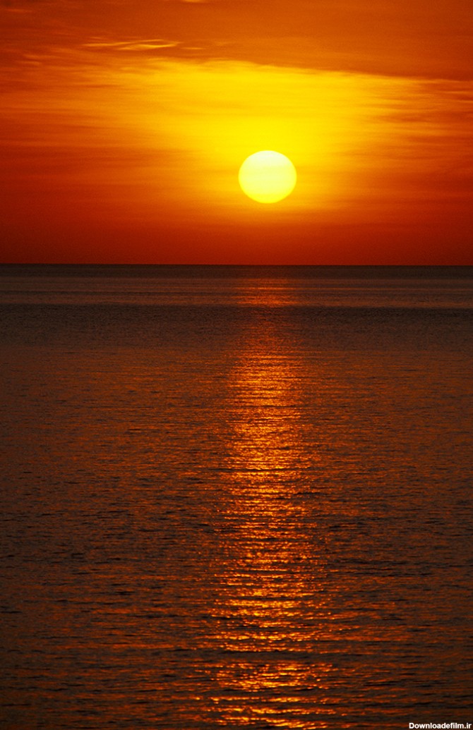 عکس خورشید و غروب دریا - مسترگراف