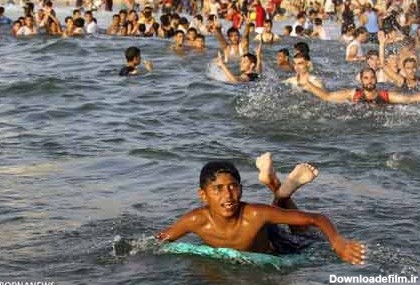عکس/ شنای زنان در سواحل غزه - مشرق نیوز