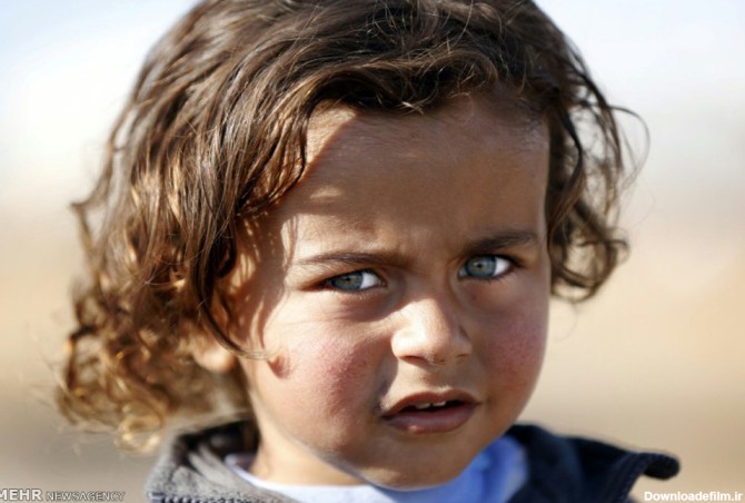 عکس/پسربچه آواره عراقی با چشم های زیبا