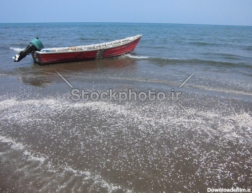 قایقی در ساحل دریای شمال - دریا - طبیعت - استوک فوتو - خرید ...