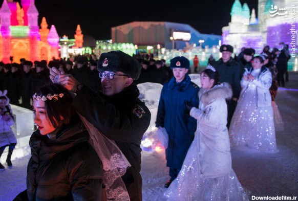 عکس/ مراسم عروسی سربازان چینی در یخبندان