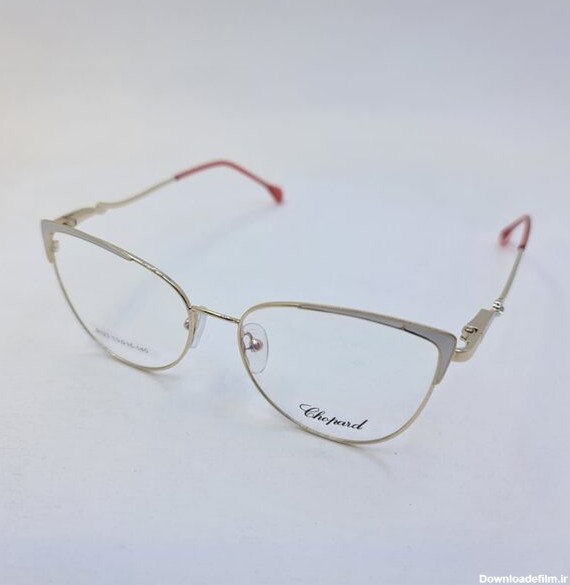 عکس از عینک طبی فلزی گربه ای شکل با فریم طلایی و سفید رنگ مدل 9123