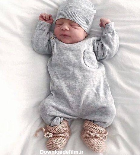 عکس نوزاد پسر با لباس سرهمی