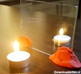 دانش آموزی مطابق تصویر شمع روشنی را جلوی شیشه شفاف و یک شمع خاموش ...