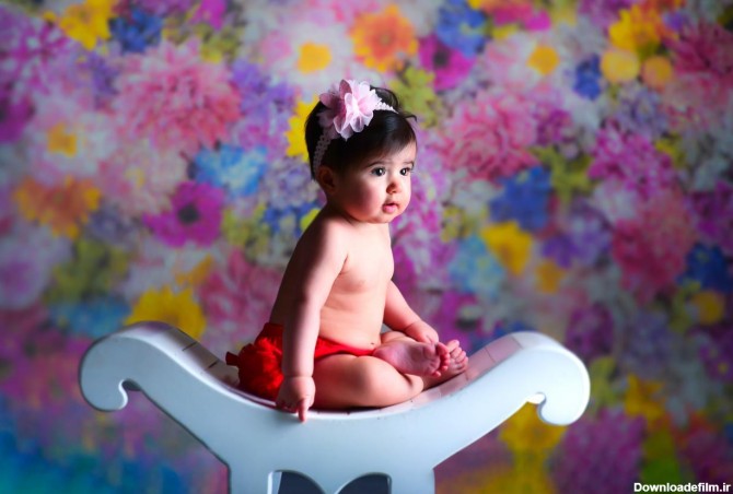 عکاسی نوزاد دختر در آتلیه کودک