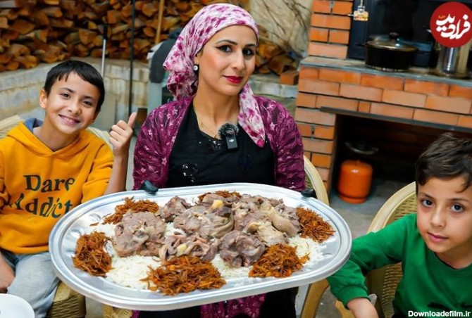 (ویدئو) پخت مشهورترین غذای عراق توسط بانوی روستایی؛ گوشت بره، لوبیا و برنج