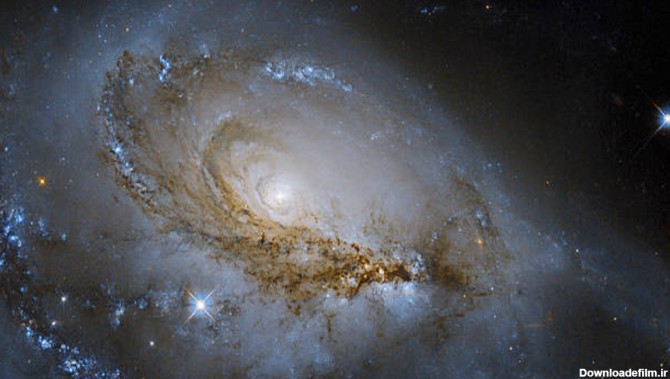 زیباترین تصویر از یک کهکشان مارپیچی توسط تلسکوپ هابل ثبت و ...