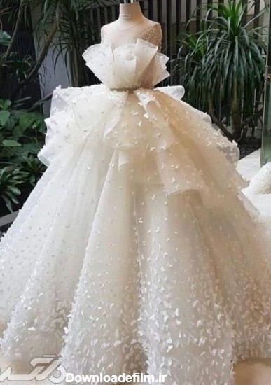 مدل لباس عروس ۲۰۱۹ آستین دار، پوشیده ، ترک تماشایی