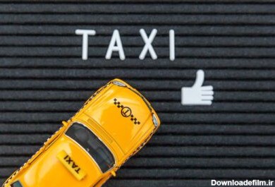 دانلود عکس به سادگی طرح تاکسی ماشین اسباب بازی زرد مدل کابین با کتیبه