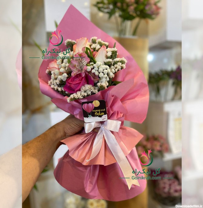 دسته گل رز صورتی و عروس و آلستر با قیمت باورنکردنی - گل نیک‌راه
