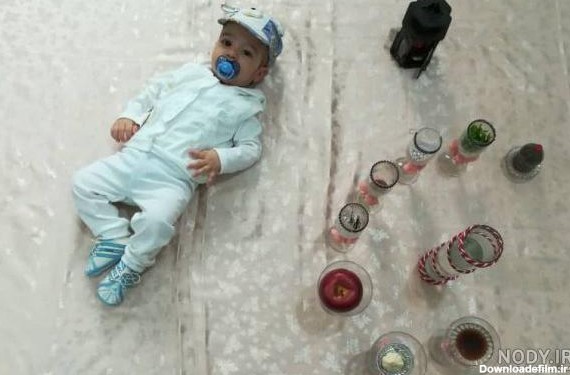 مدل عکس کودک با قوطی شیر خشک