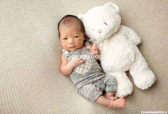مدل عکاسی آتلیه ای نوزاد پسر با عروسک - مجله اینترنتی رامینا