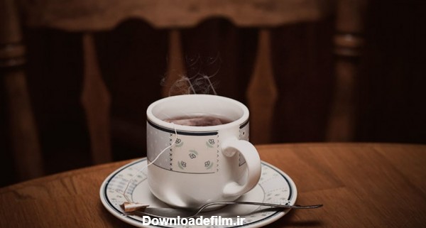 تصویر پس زمینه فنجان چای داغ روی میز | پیکفری