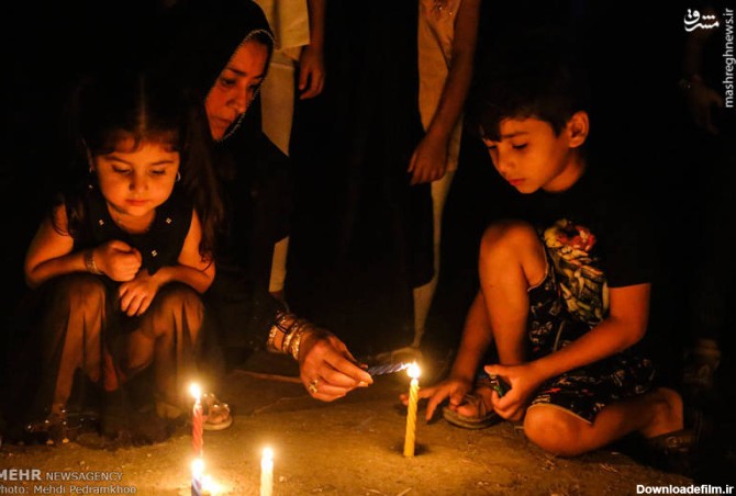 مشرق نیوز - عکس/ روشن کردن شمع برای شهدای اهواز